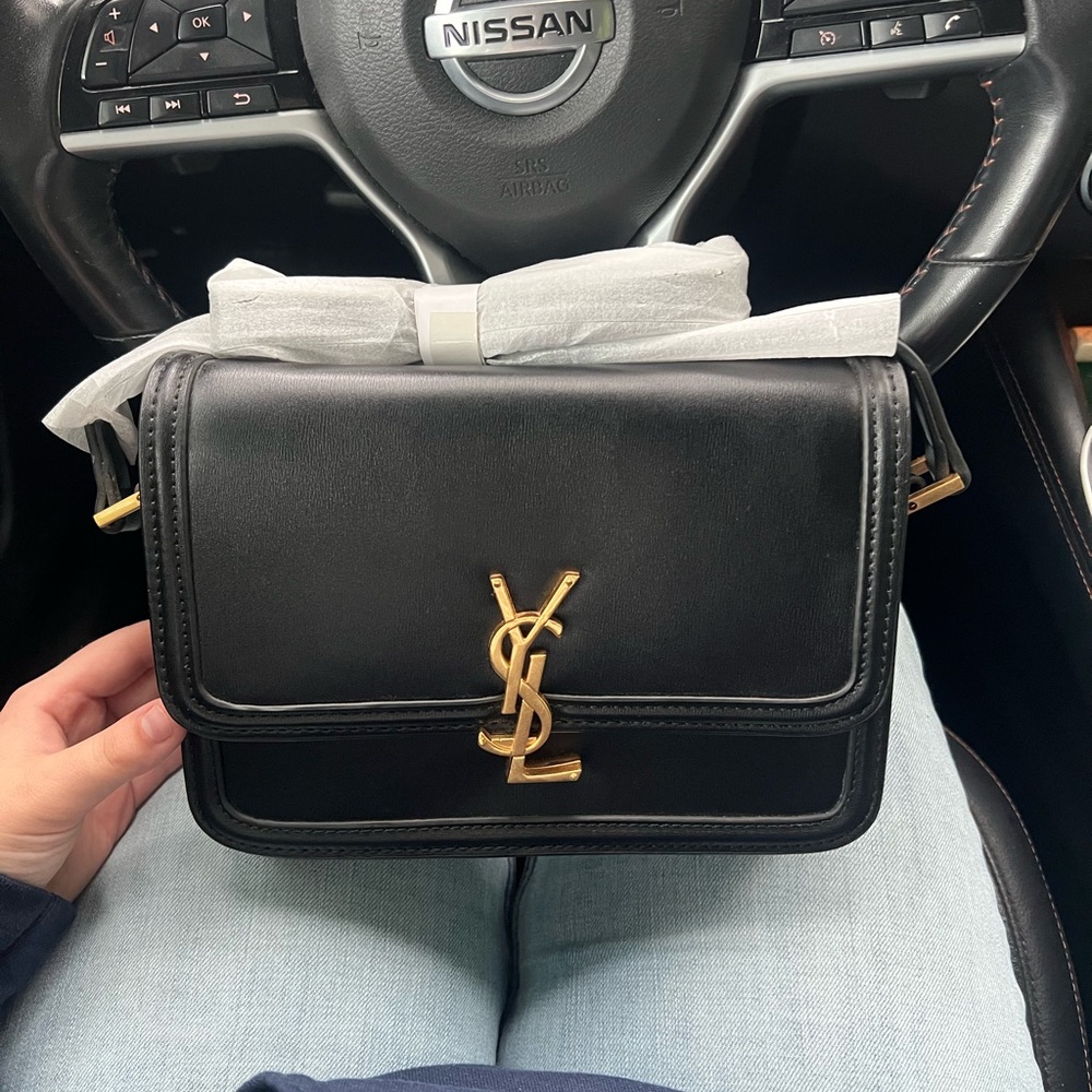 Yves Saint Laurent Black Bag with Gold Logo